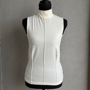 Reformation cream top with high neck and open back detail Size M